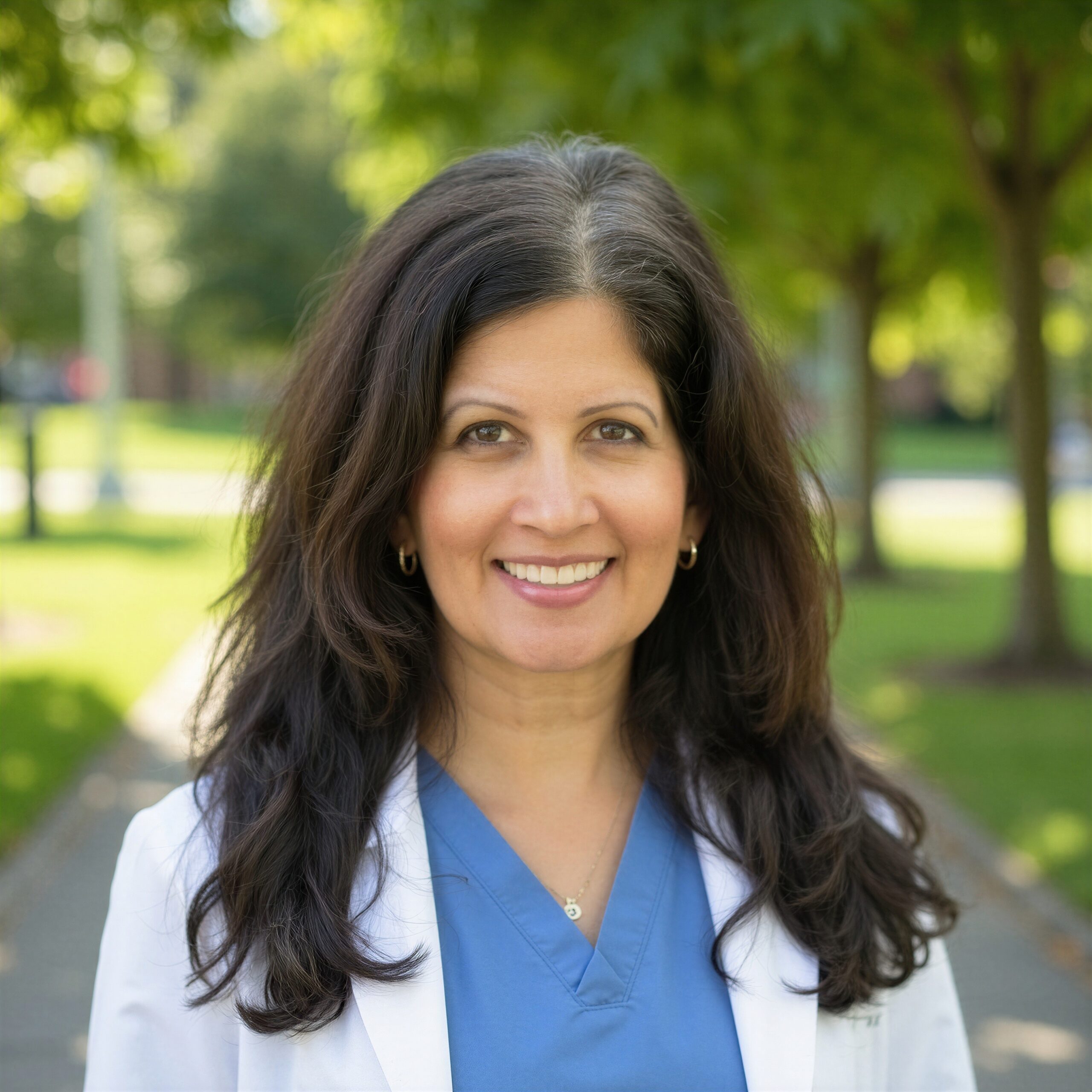 Dr. Patel in lab coat